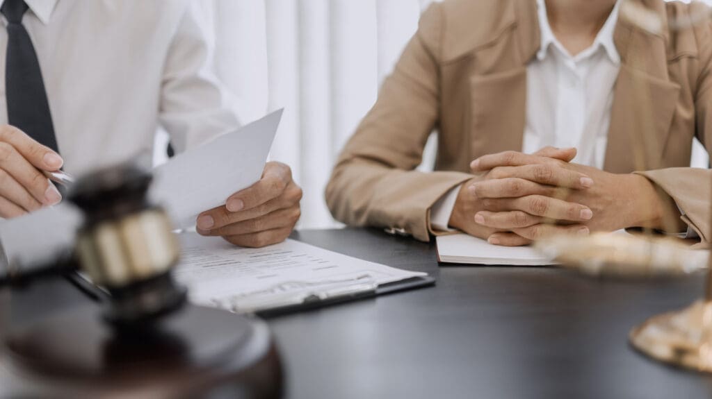 Lawyer and client negotiation in legal judgement consulting. criminal attorney